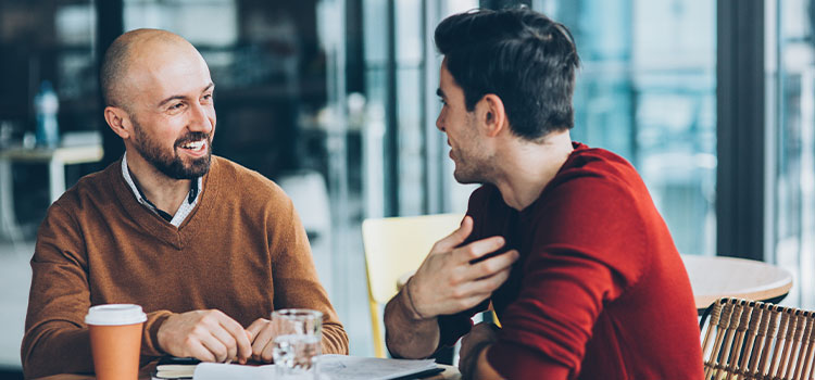 two men meeting and talking
