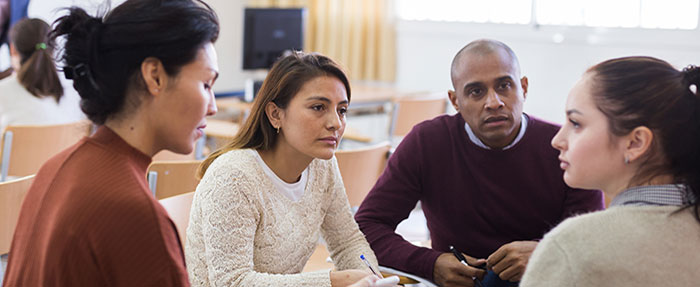 group of students talking together